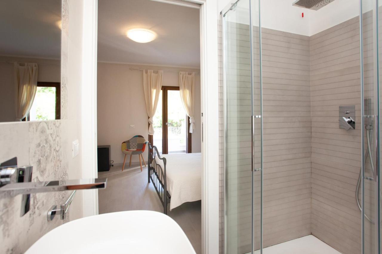 Lu Lioni Rooms Сан-Теодоро Экстерьер фото