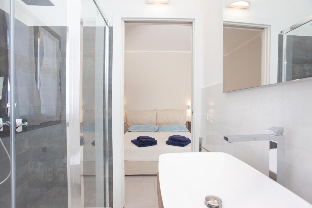 Lu Lioni Rooms Сан-Теодоро Экстерьер фото